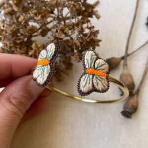Brazalete mariposa Naranjo y beige